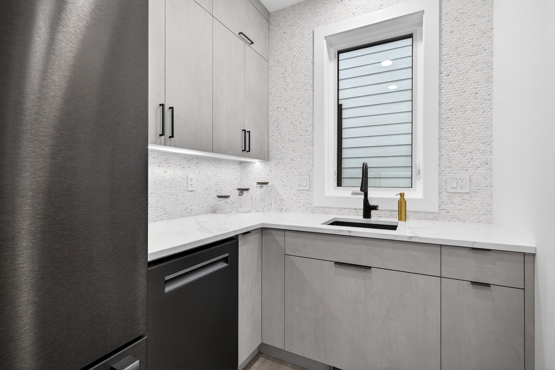 Family-ready butler's pantry view 3, with integrated appliances and custom cabinetry